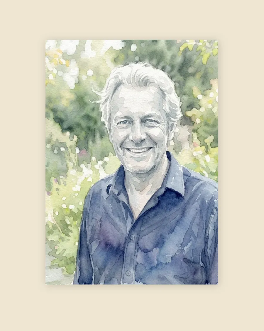 Example portrait of a smiling grey-haired man in a garden, on an unframed paper print.